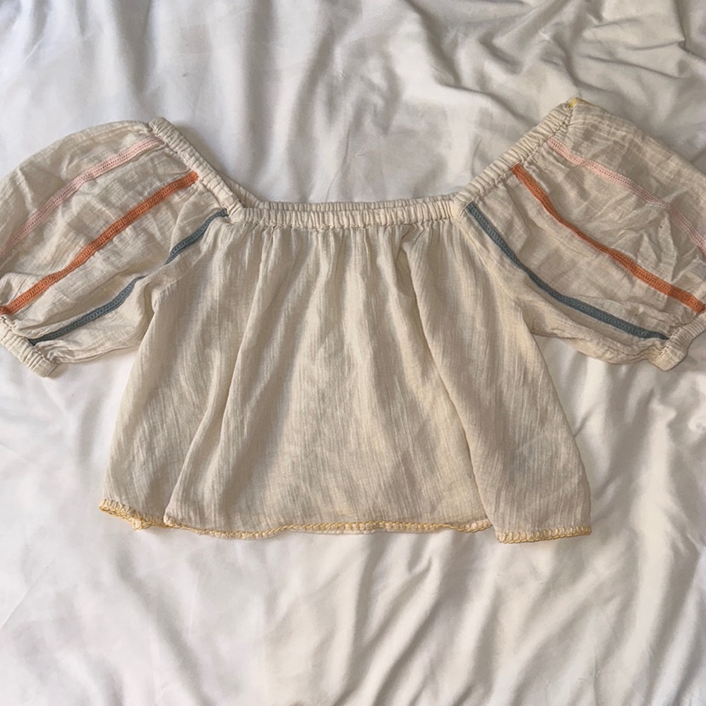 Tan, puff short sleeve shirt, pastel stripes on sleeve, good condition.
